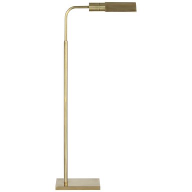 Gold floor lamp with adjustable arm on a white background