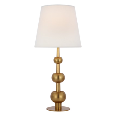 Gold table lamp with a white shade on a transparent background