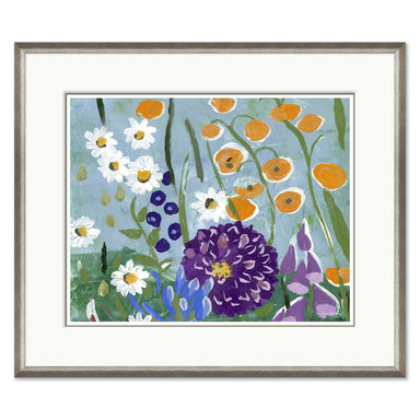 Framed artwork of colorful flowers on a blue background