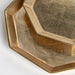 close up on gilded hex trays