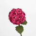 hot pink paper flower with leaves