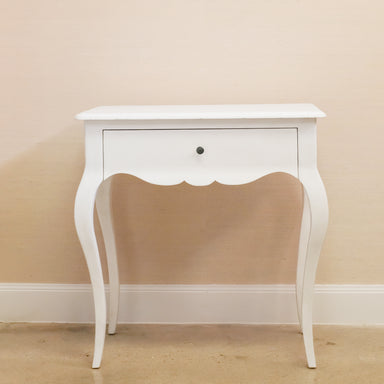 front view of curvy leg white side table with one drawer
