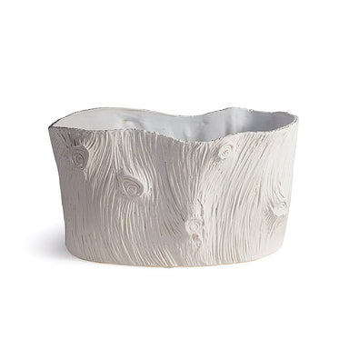 White ceramic planter with wood grain texture on a white background