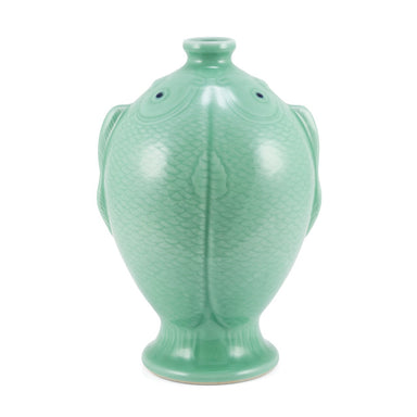 Green ceramic fish-shaped vase on a white background