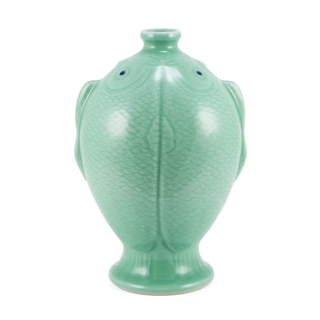 Green ceramic fish-shaped vase on a white background
