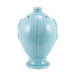 Light blue ceramic fish-shaped vase on a white background