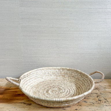 woven grass basket with handles