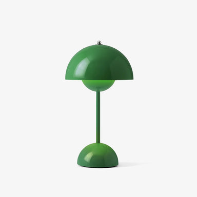Green table lamp on a white background