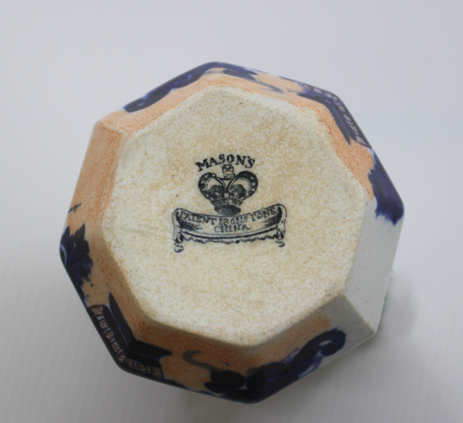 Hexagonal ceramic item with 'Masons' branding on a white background
