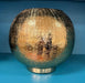Gold textured spherical object on a blue background