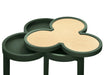 Green side table with green base and beige grasscloth top on a white background