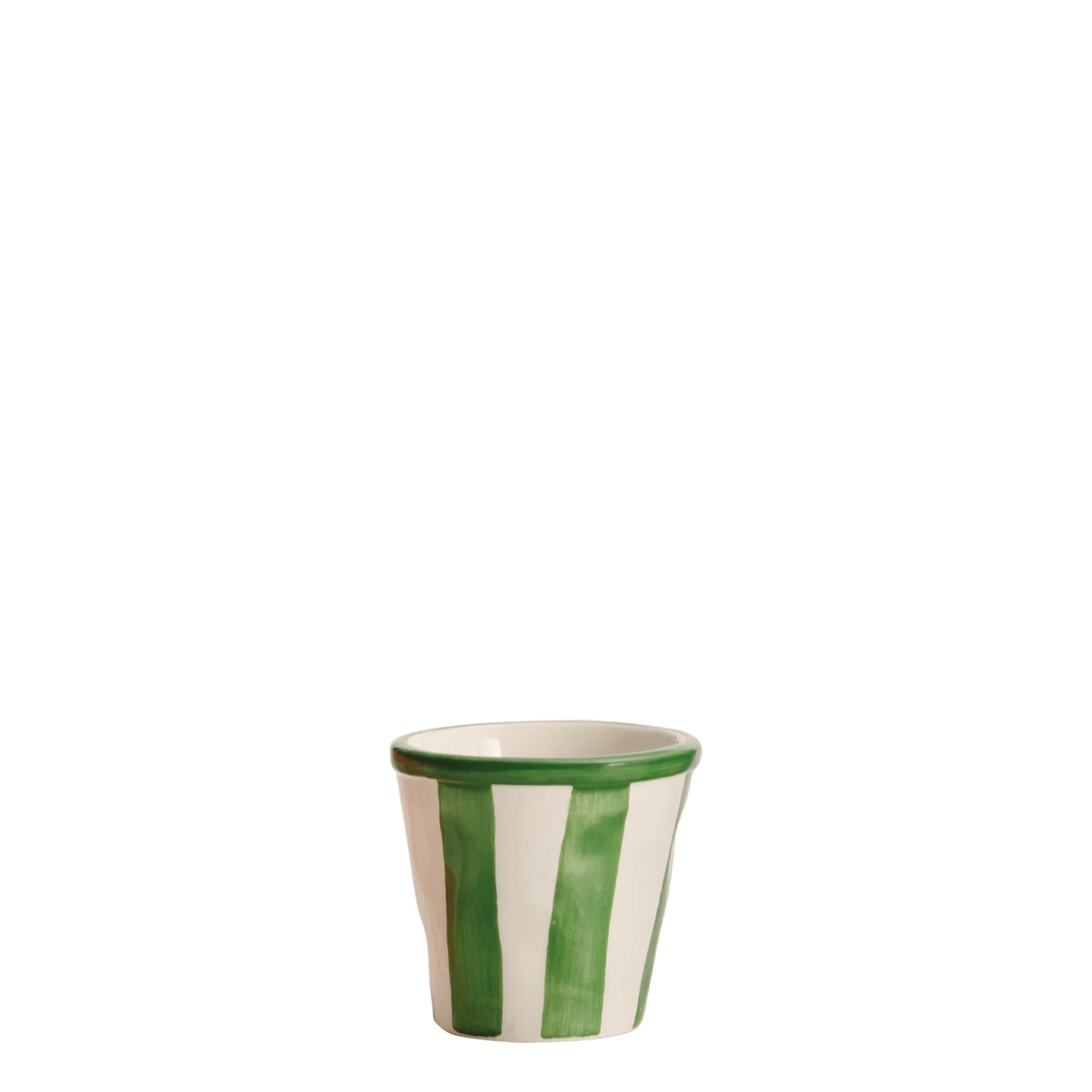 Ceramic cup with green and white stripes on a white background