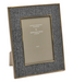 Herringbone patterned photo frame with gold trim on a white background