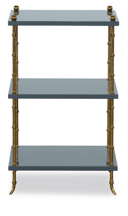 Three-tiered shelf with brass accents on a white background