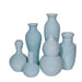 Set of light blue ceramic vases on a white background