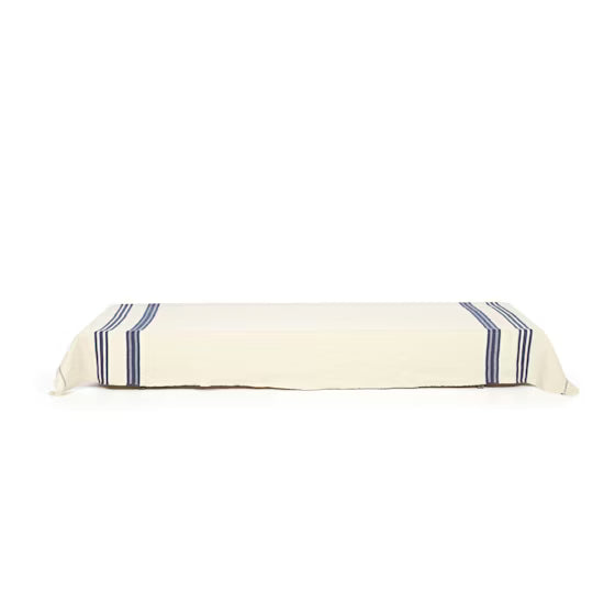 Coverlet with blue stripes on a white background