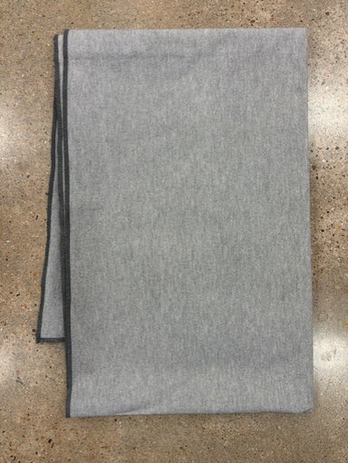 Gray blanket on a textured surface