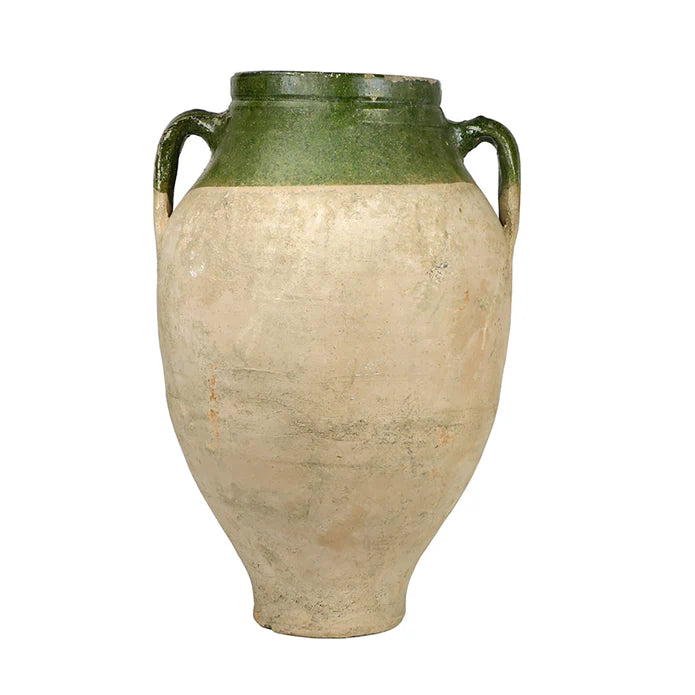 Tall ceramic vase with green top and beige body on a white background