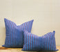 pair of blue and red stripe pillows