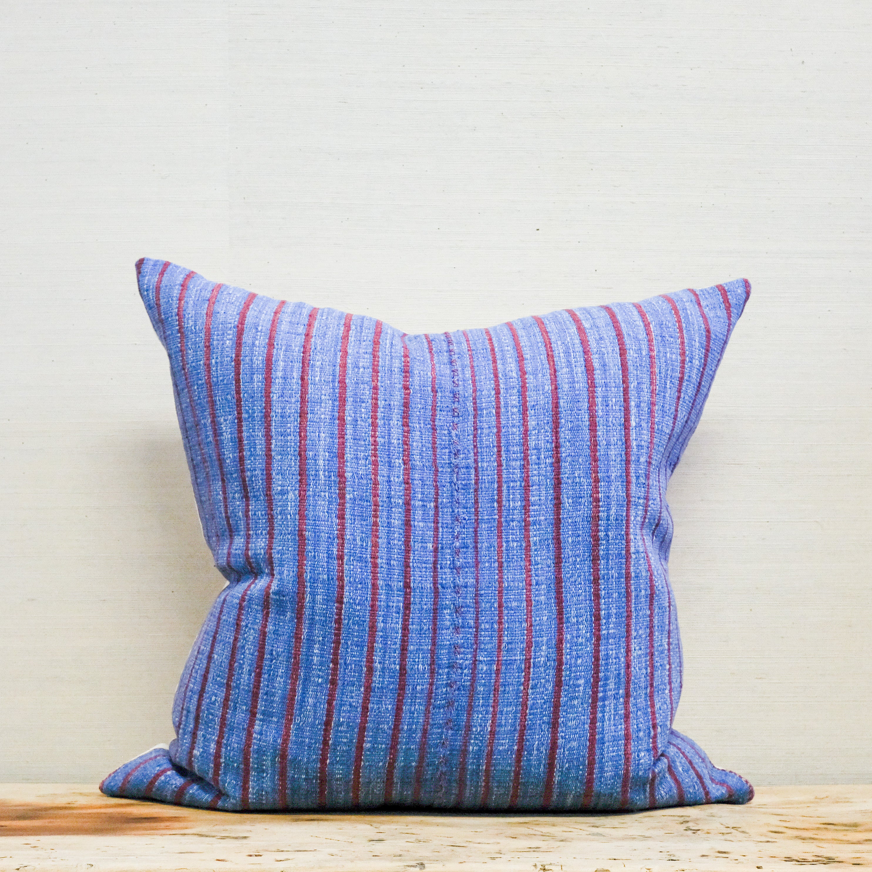 red and blue stripe pillow