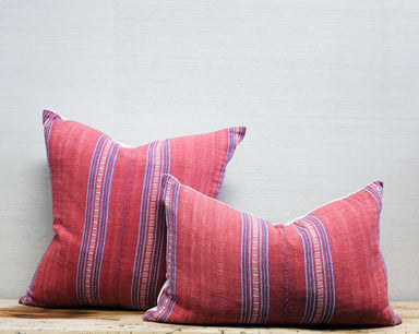 square and oblong pillows in red and blue