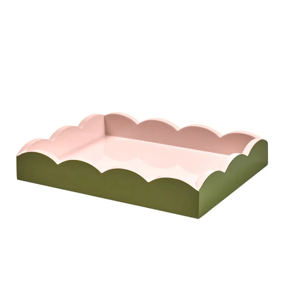 Decorative tray with scalloped edge in pink and green on a white background