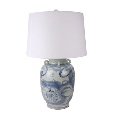 Table lamp with blue and white floral design on a white background
