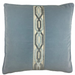 Blue velvet pillow with a decorative tape pattern on a white background