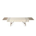 Long wooden table with a striped runner on a white background