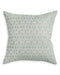 Decorative pillow with a subtle pattern on a white background