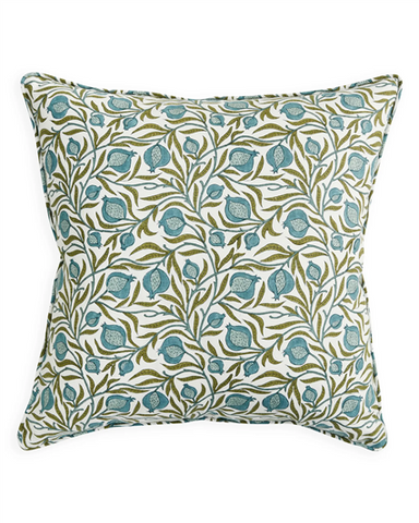 A square decorative throw pillow featuring an all-over botanical pattern of teal-blue berries and olive-green leaves on a warm off-white background.