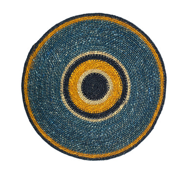 Round woven mat with concentric circle pattern in blue, yellow, and black on a white background