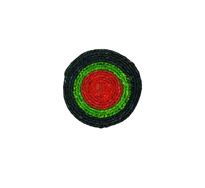 Round woven object with concentric green and red circles on a white background