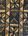 Patterned fabric with black and gold geometric design