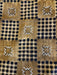 Textile with geometric patterns in brown, black, and white