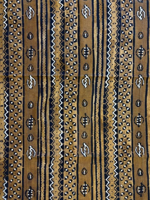 Patterned fabric with vertical stripes in brown, black, and beige.