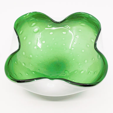 interior view of green and white glass bowl