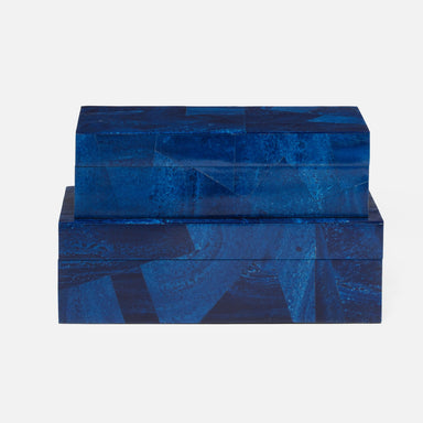 stack of deep blue decor boxes