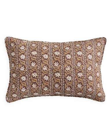 A rectangular lumbar throw pillow with a brown, beige, and white vertical block-print pattern, shown against a plain white background.