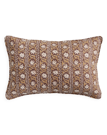 A rectangular lumbar throw pillow with a brown, beige, and white vertical block-print pattern, shown against a plain white background.