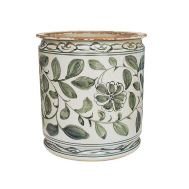 Ceramic planter with green floral and leaf pattern on a white background