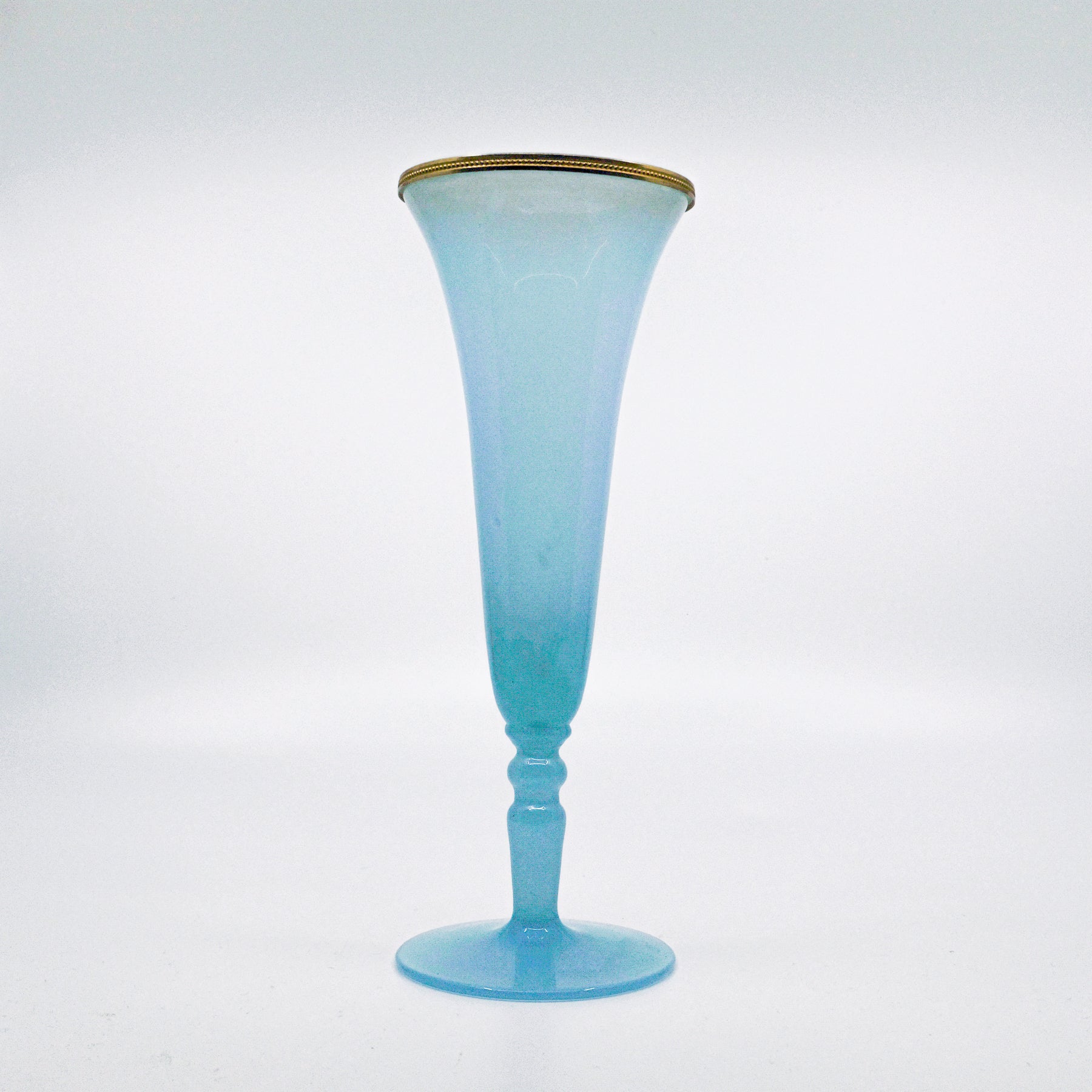 pale blue opaline trumpet vase with brass rim