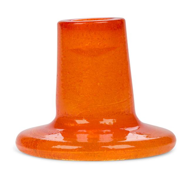 Orange glass candleholder on a white background