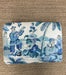 Fabric with blue and white pattern on a brown background
