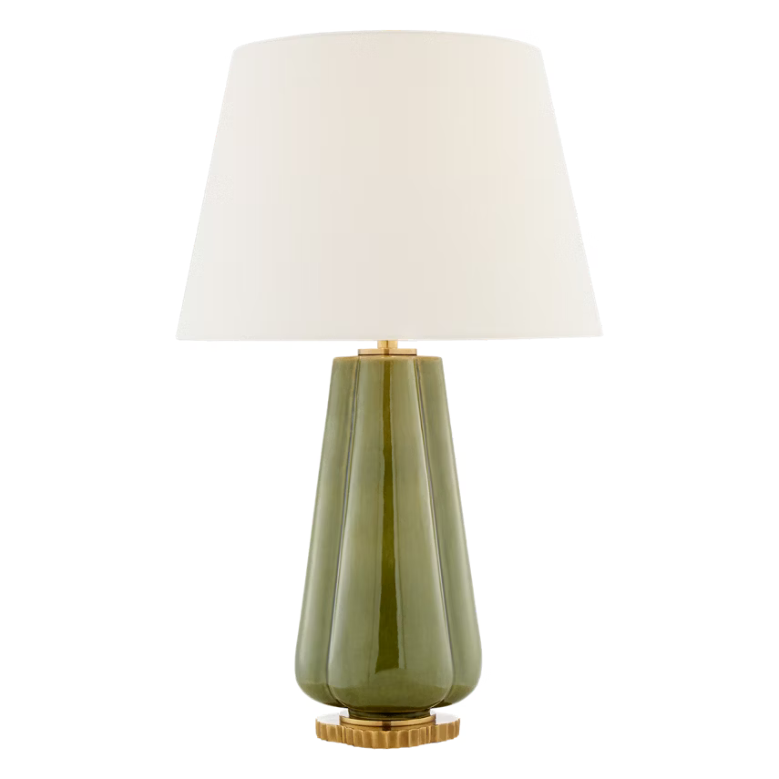 Table lamp with a green base and white shade on a transparent background