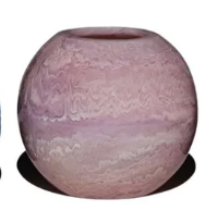 Pink resin vase on a white background