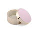 Round container with a pink lid on a white background