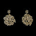 Pair of gold and pearl cluster  earrings on a black background