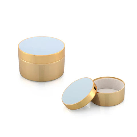 Gold jewelry box with a light blue interior on a white background