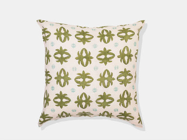 geometric green design on white pillow